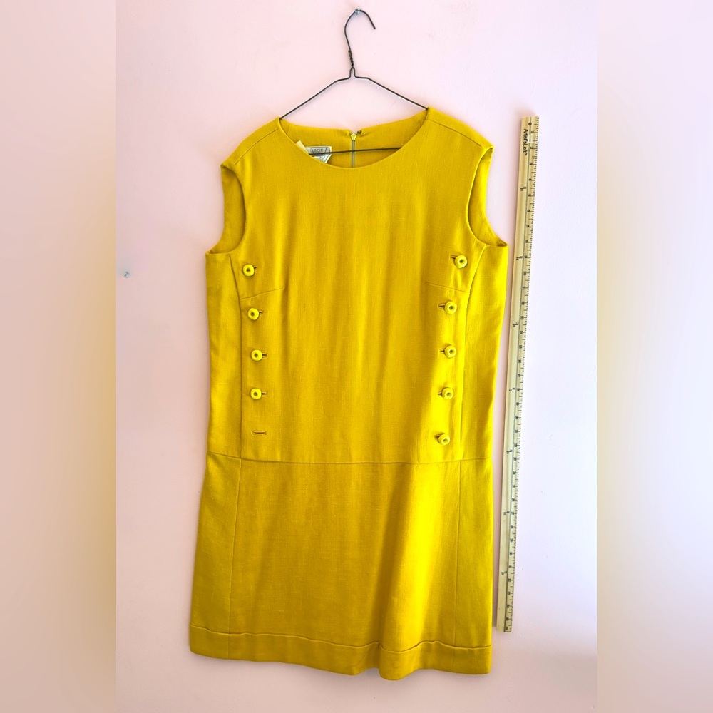 Vogue Sunny Yellow Sleeveless Button-Accent Mini Dress